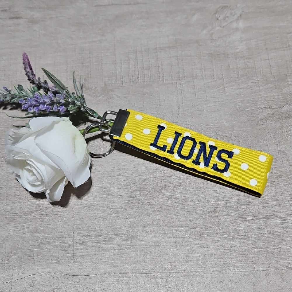 Lions 🎁 Yellow, White Polka Dot, and Navy Blue Strap Key Holder Bag Charm
